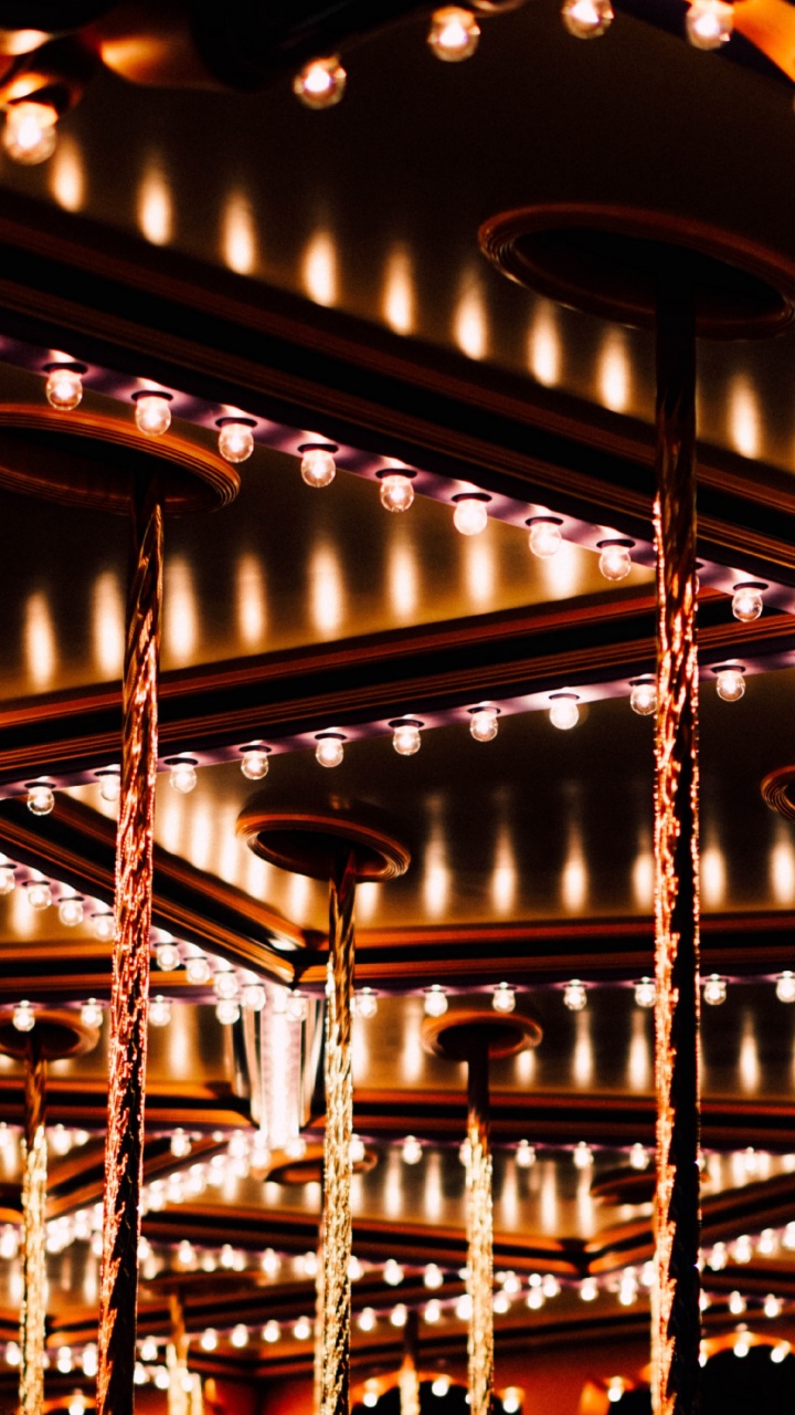 Étagères en Bois Marron Avec Des Lumières. Wallpaper in 720x1280 Resolution