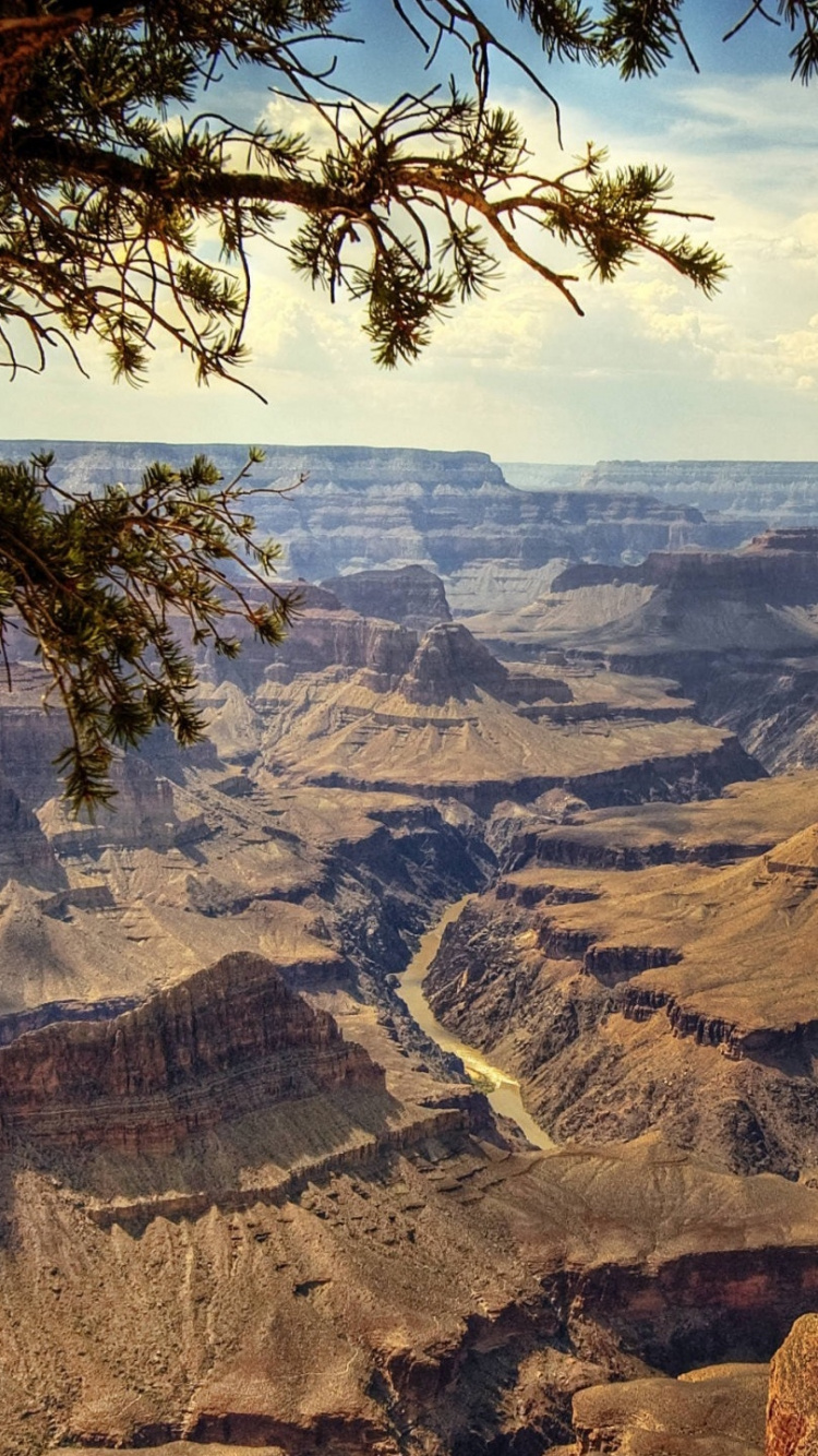 Montagne Rocheuse Brune Sous Ciel Bleu Pendant la Journée. Wallpaper in 750x1334 Resolution