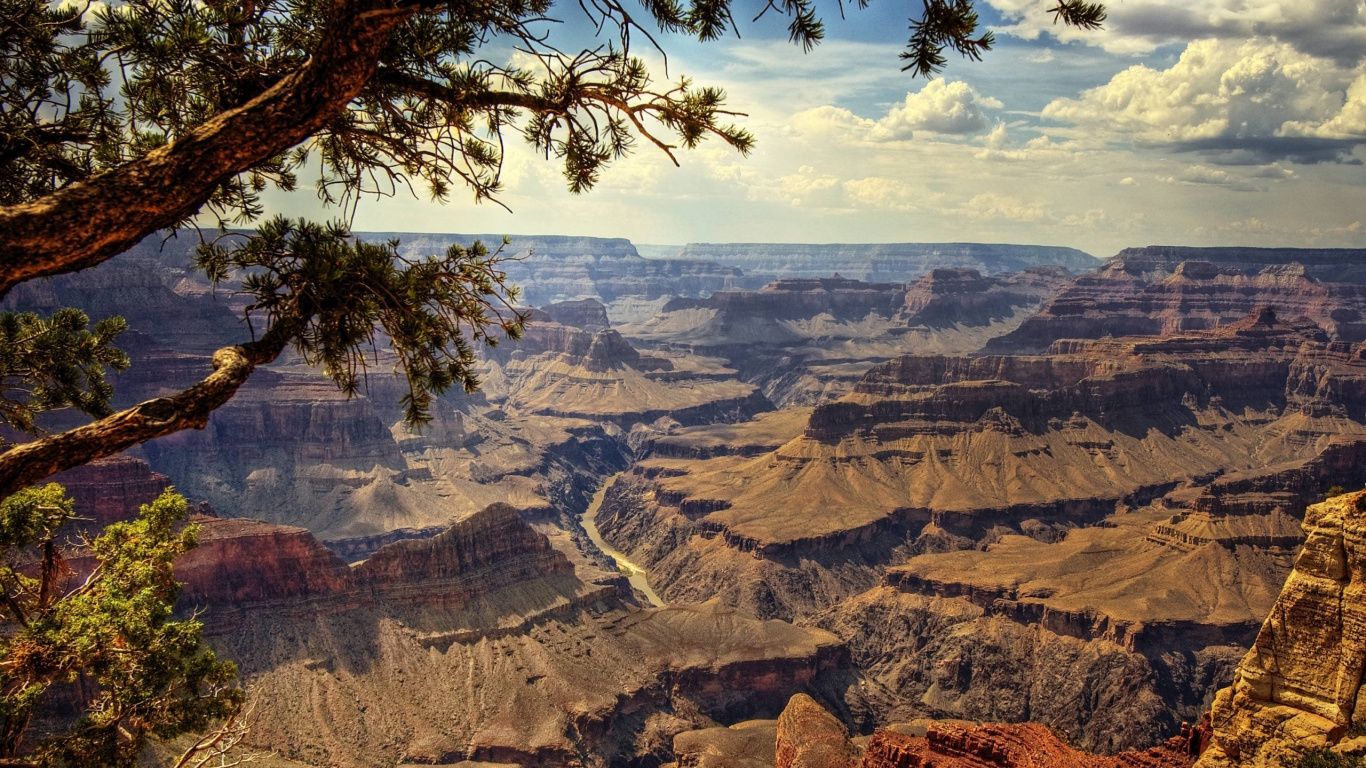 Brown Rocky Mountain Under Blue Sky During Daytime. Wallpaper in 1366x768 Resolution