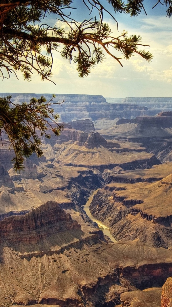 Brown Rocky Mountain Under Blue Sky During Daytime. Wallpaper in 720x1280 Resolution