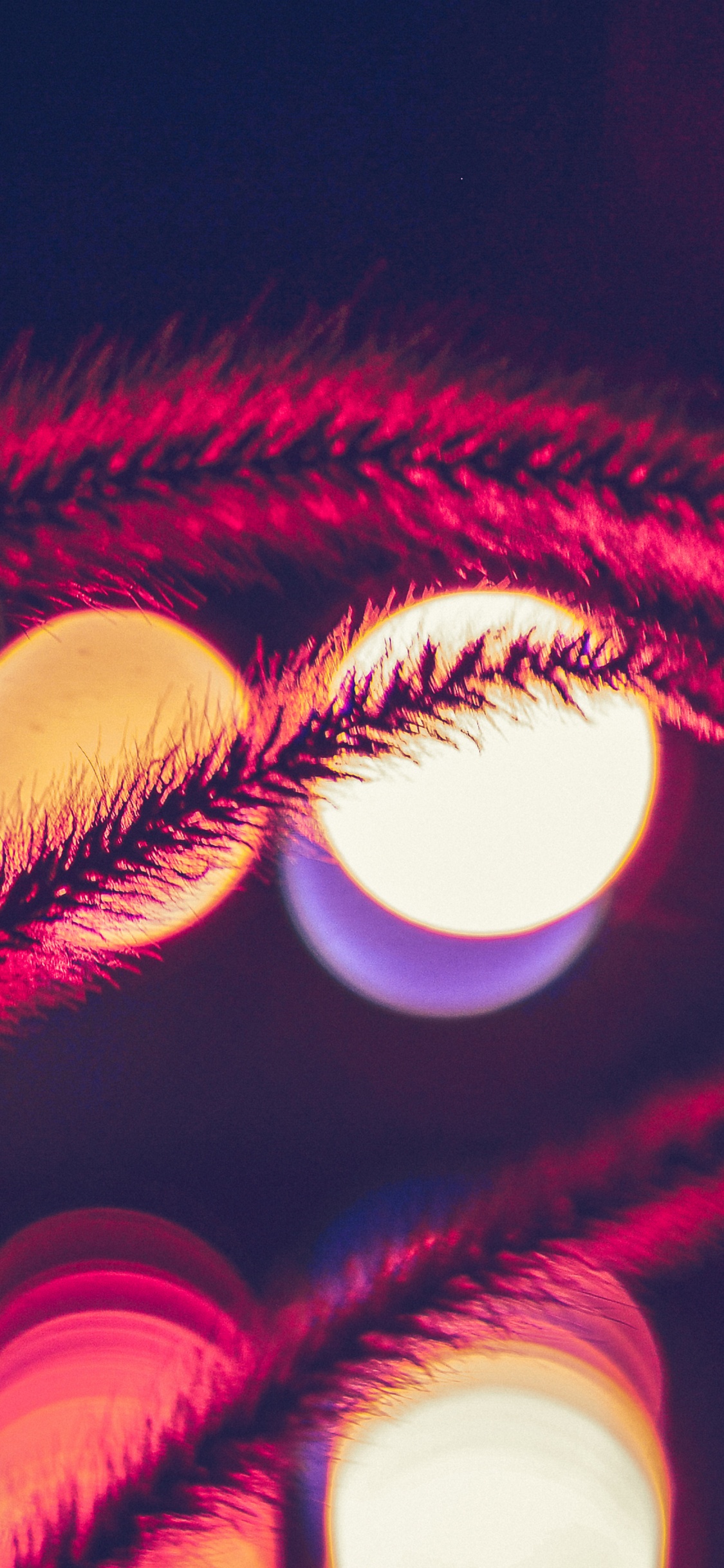 Red and White Round Lights. Wallpaper in 1125x2436 Resolution