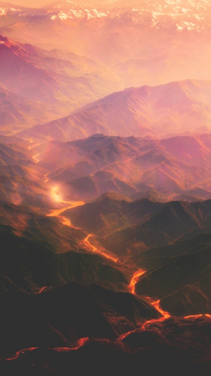 Brown Mountains Under White Clouds During Daytime. Wallpaper in 720x1280 Resolution