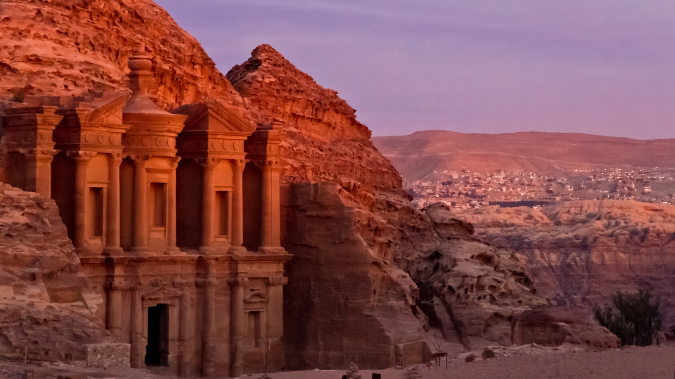 Brown Concrete Building Near Brown Rocky Mountain During Daytime. Wallpaper in 1366x768 Resolution