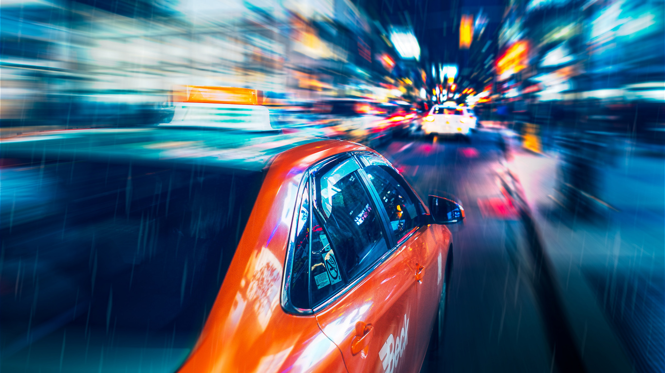 Rotes Auto Auf Der Straße Während Der Nachtzeit. Wallpaper in 1366x768 Resolution