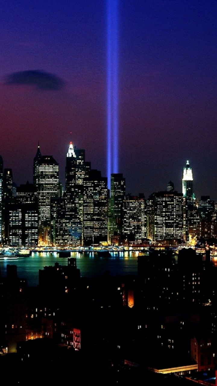 Horizonte de la Ciudad Durante la Noche. Wallpaper in 720x1280 Resolution