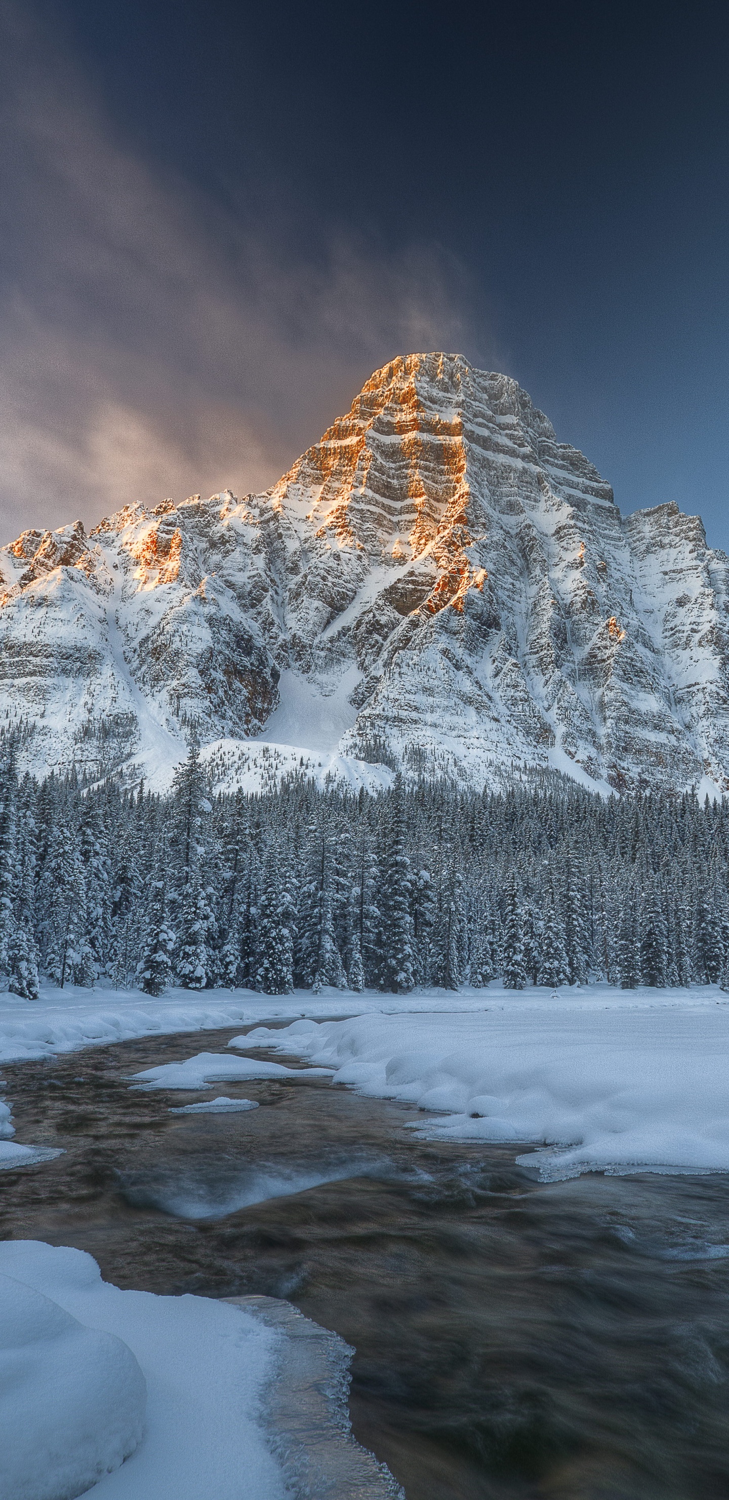 Snow Covered Mountain Under Blue Sky. Wallpaper in 1440x2960 Resolution