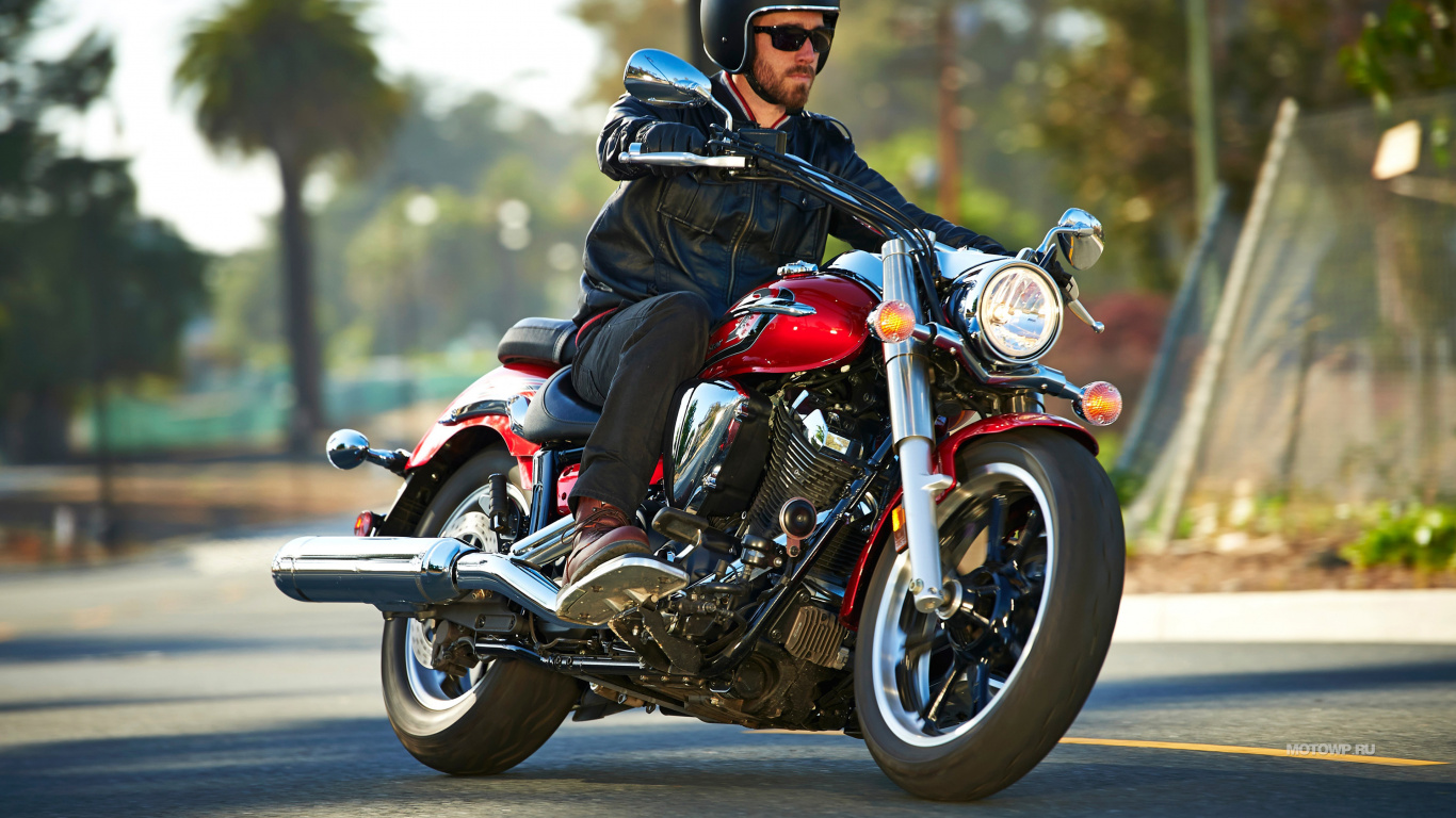 Man in Black Jacket Riding Red and Black Cruiser Motorcycle. Wallpaper in 1366x768 Resolution
