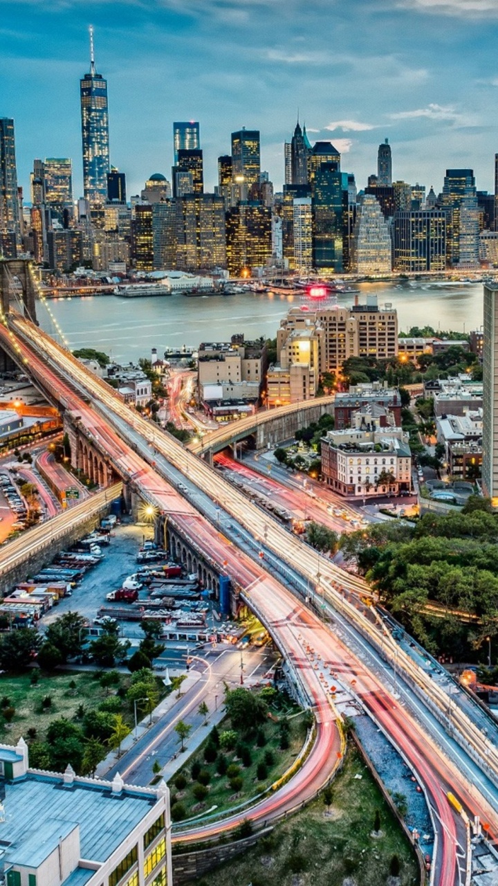 City Buildings and Cars on Highway During Night Time. Wallpaper in 720x1280 Resolution