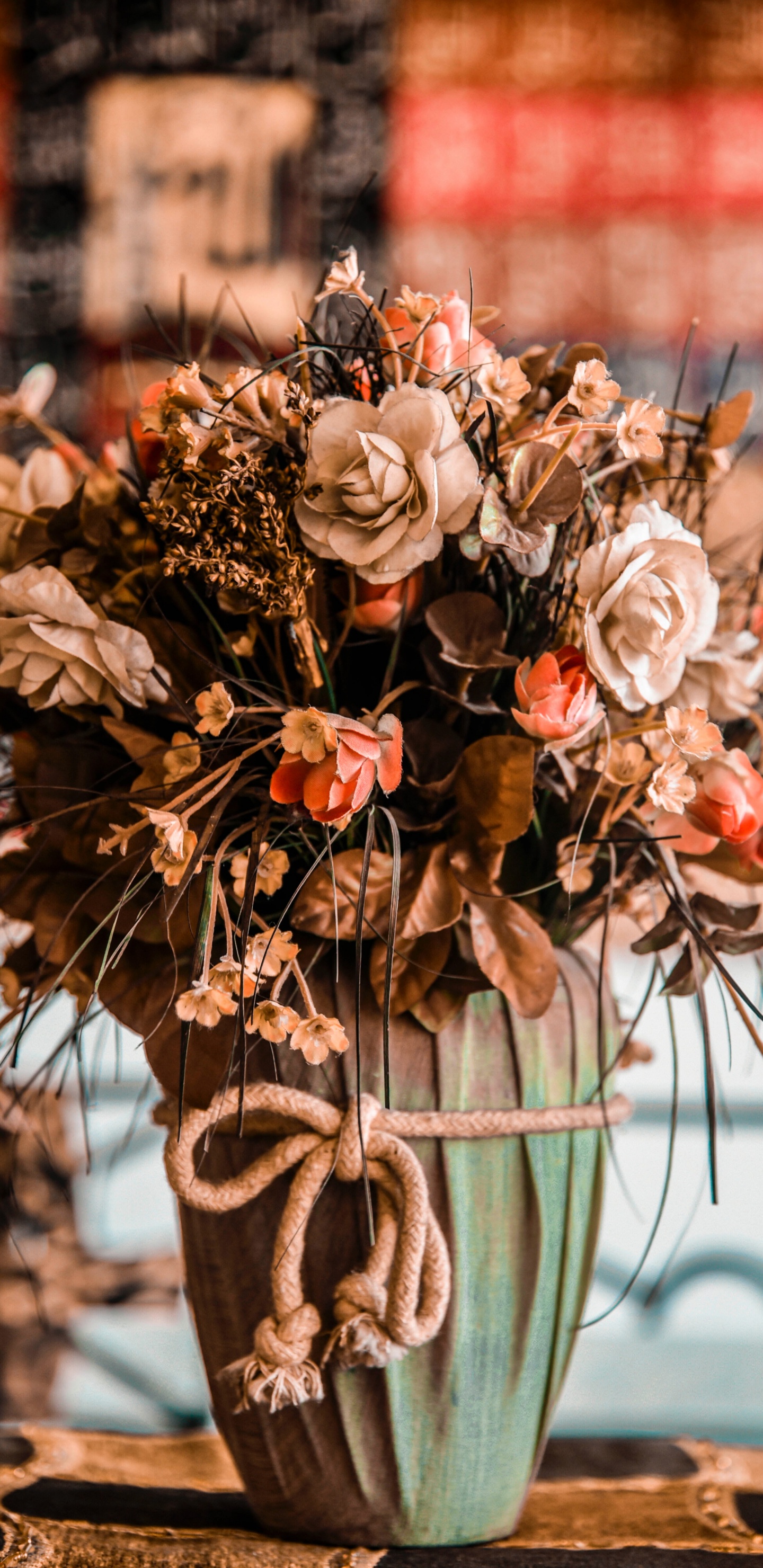 Brown and White Flowers in Green Ceramic Vase. Wallpaper in 1440x2960 Resolution