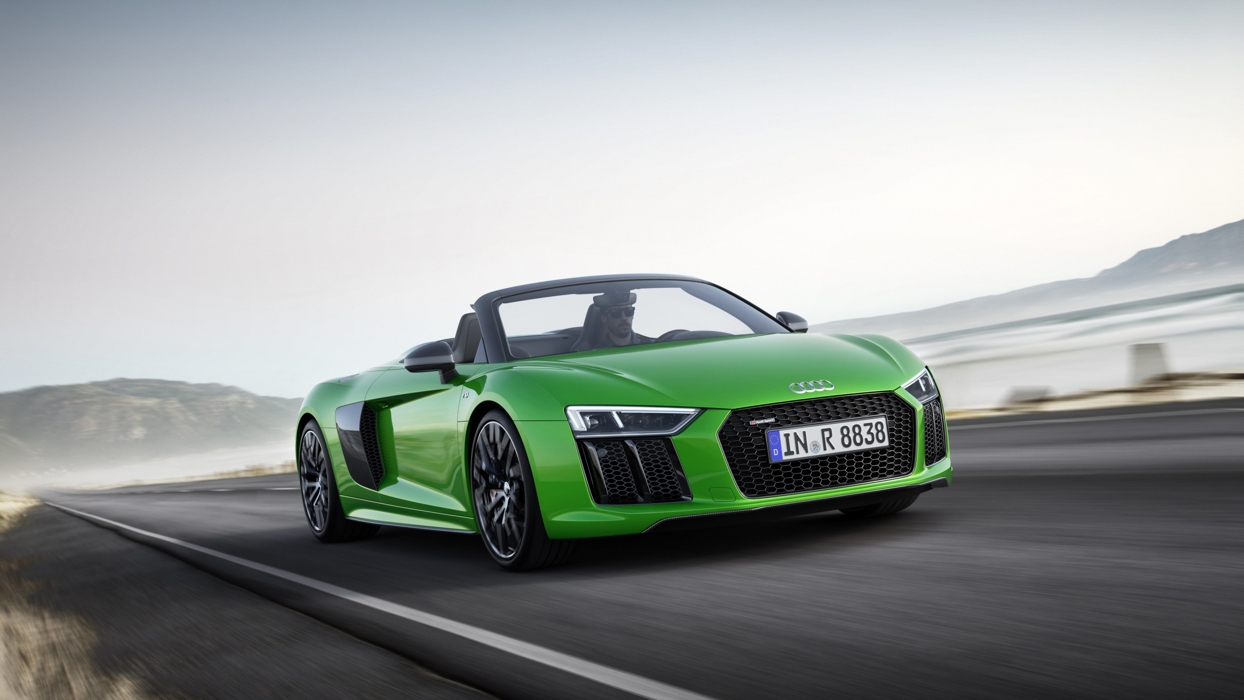 Green Porsche 911 on Gray Asphalt Road. Wallpaper in 2560x1440 Resolution