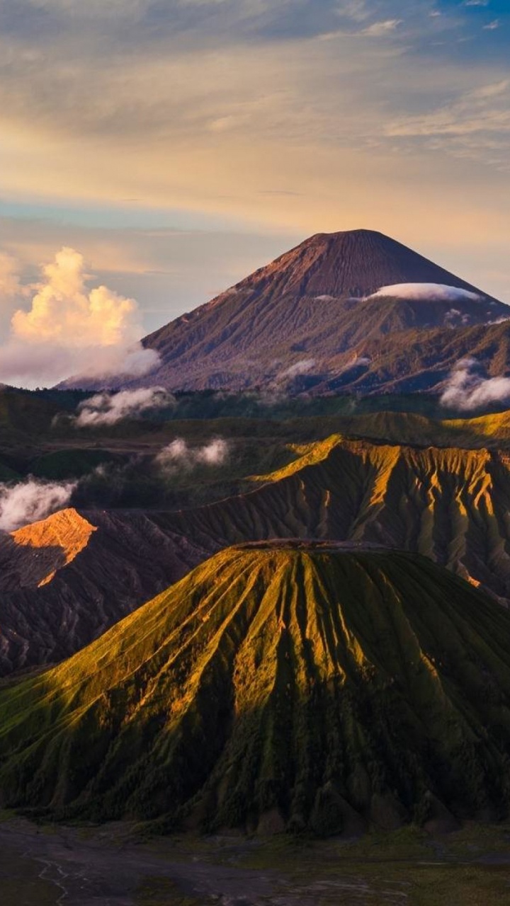 Brown and Green Mountain Under White Clouds During Daytime. Wallpaper in 720x1280 Resolution