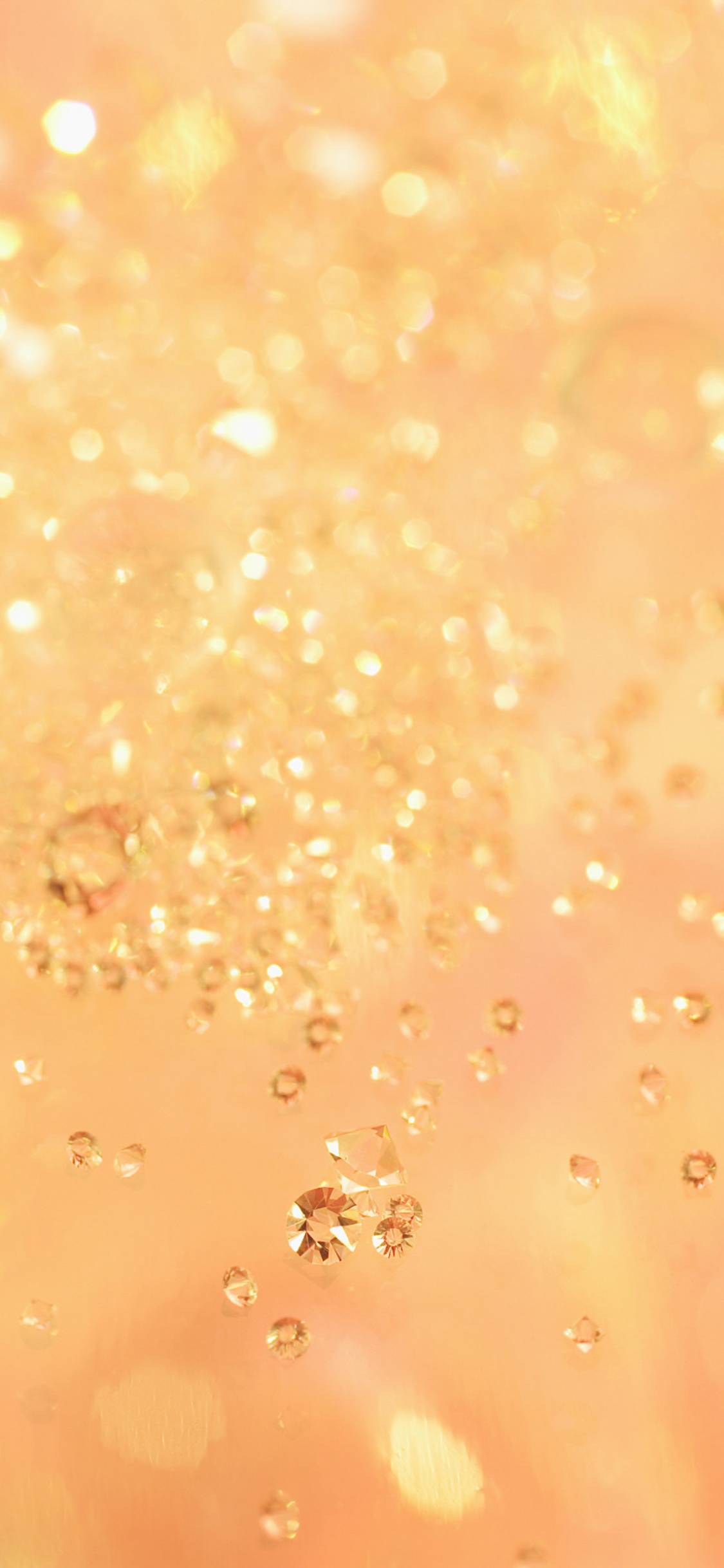 Gotas de Agua Sobre la Superficie Naranja. Wallpaper in 1125x2436 Resolution