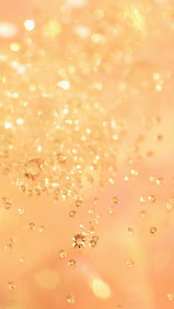 Gotas de Agua Sobre la Superficie Naranja. Wallpaper in 720x1280 Resolution