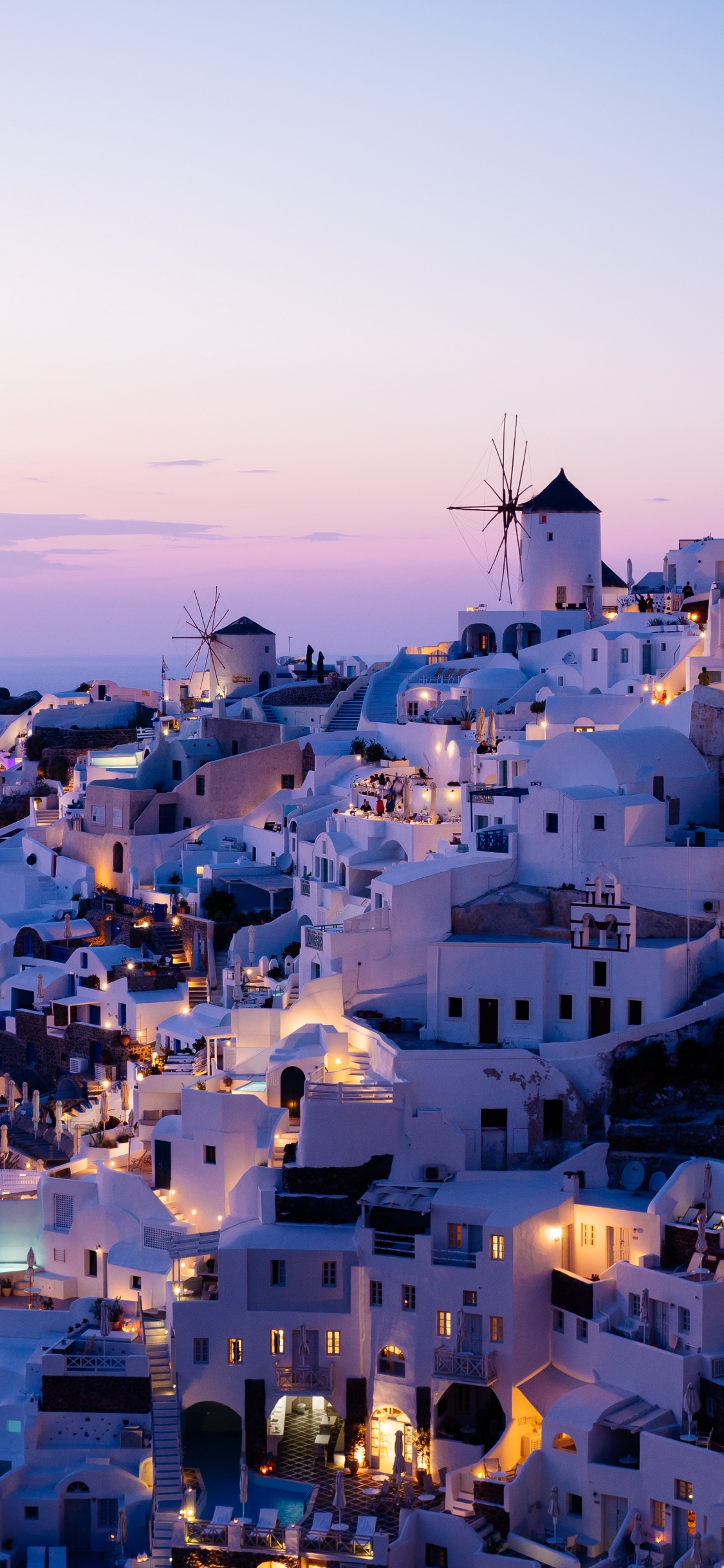 White Concrete Buildings During Daytime. Wallpaper in 1125x2436 Resolution