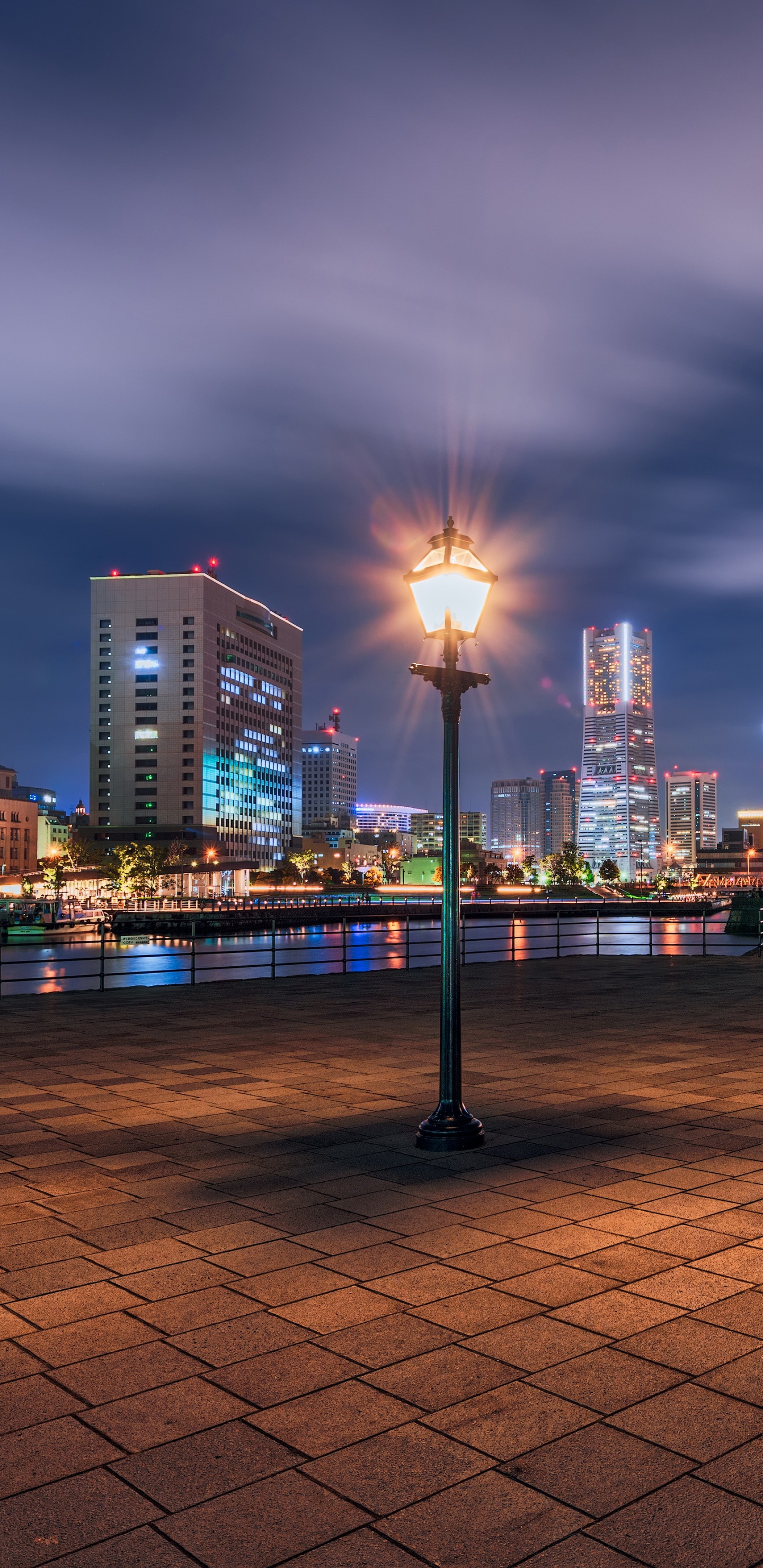 People Walking on Sidewalk During Night Time. Wallpaper in 1440x2960 Resolution
