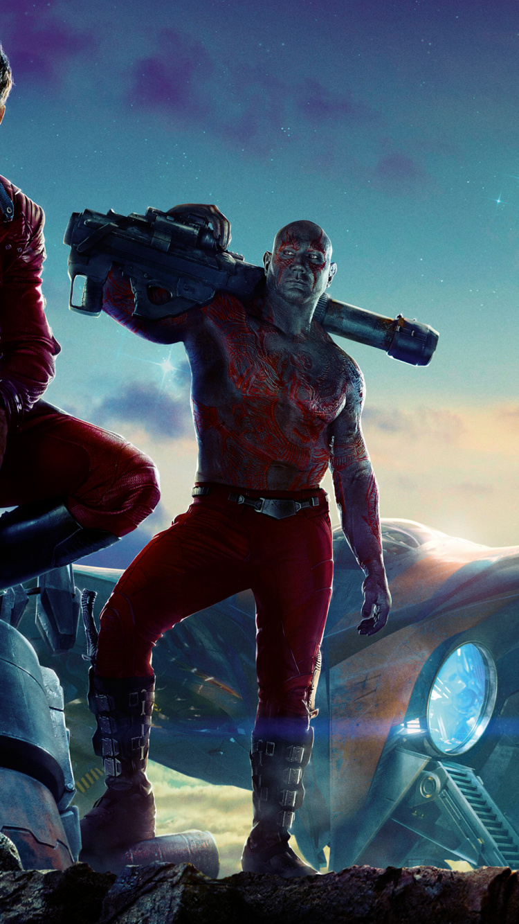 3 Men Holding Gun Standing on Rock. Wallpaper in 750x1334 Resolution