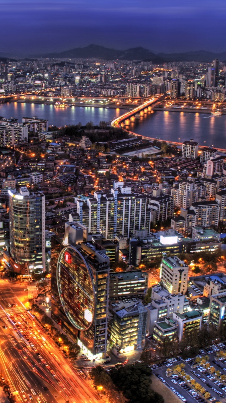 Aerial View of City Buildings During Night Time. Wallpaper in 720x1280 Resolution