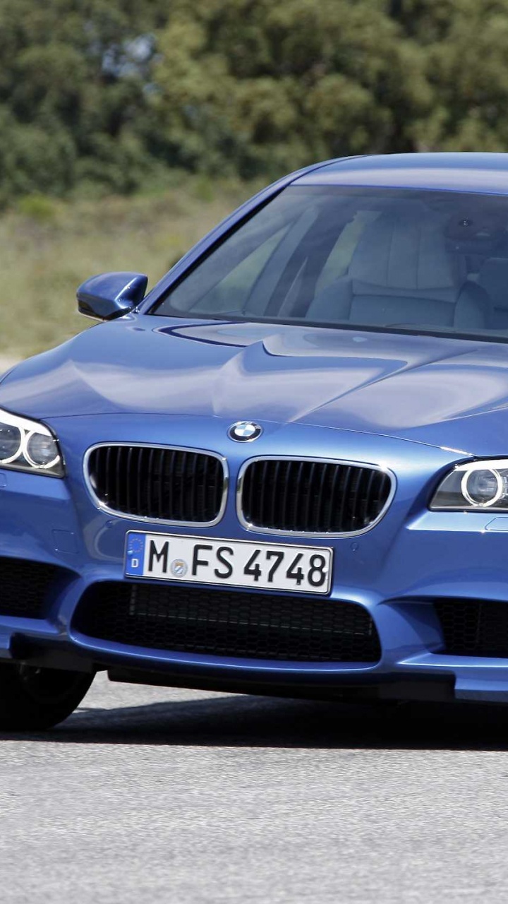 Blue Bmw m 3 on Road During Daytime. Wallpaper in 720x1280 Resolution