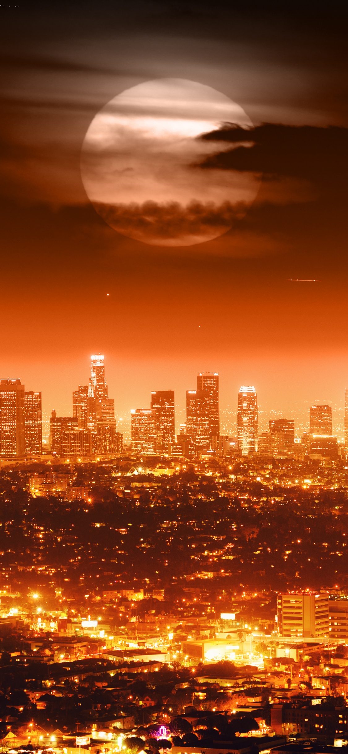 Horizonte de la Ciudad Durante la Noche. Wallpaper in 1125x2436 Resolution