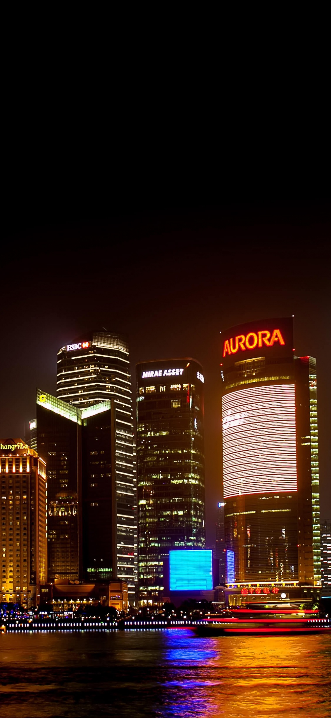 Horizonte de la Ciudad Durante la Noche. Wallpaper in 1125x2436 Resolution