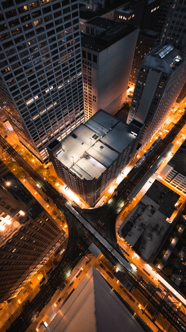 High Rise Buildings During Night Time. Wallpaper in 720x1280 Resolution