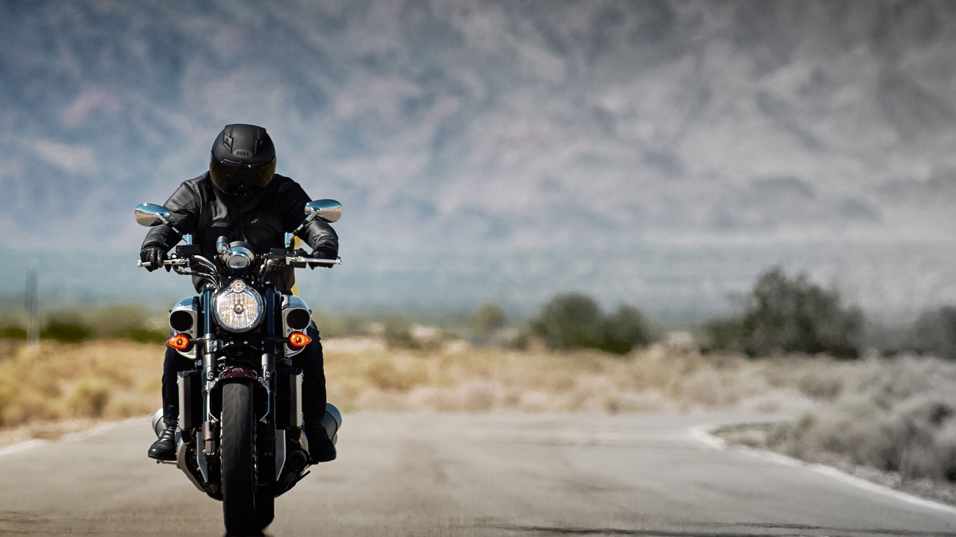 Man in Black Motorcycle Helmet Riding Motorcycle on Road During Daytime. Wallpaper in 1366x768 Resolution