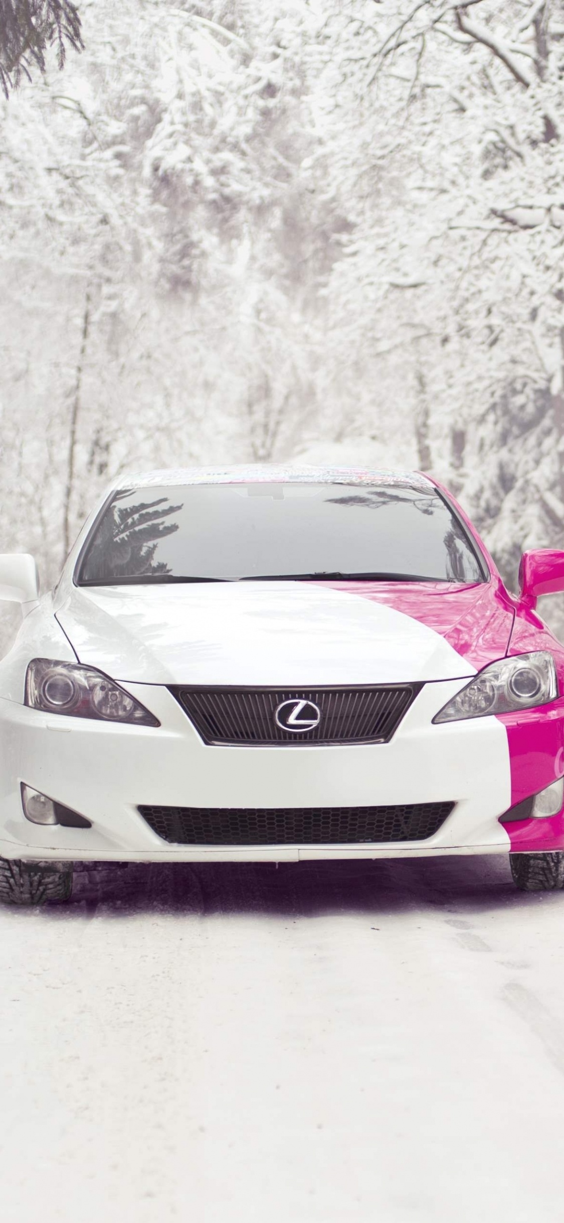 White Bmw Car on Snow Covered Road During Daytime. Wallpaper in 1125x2436 Resolution