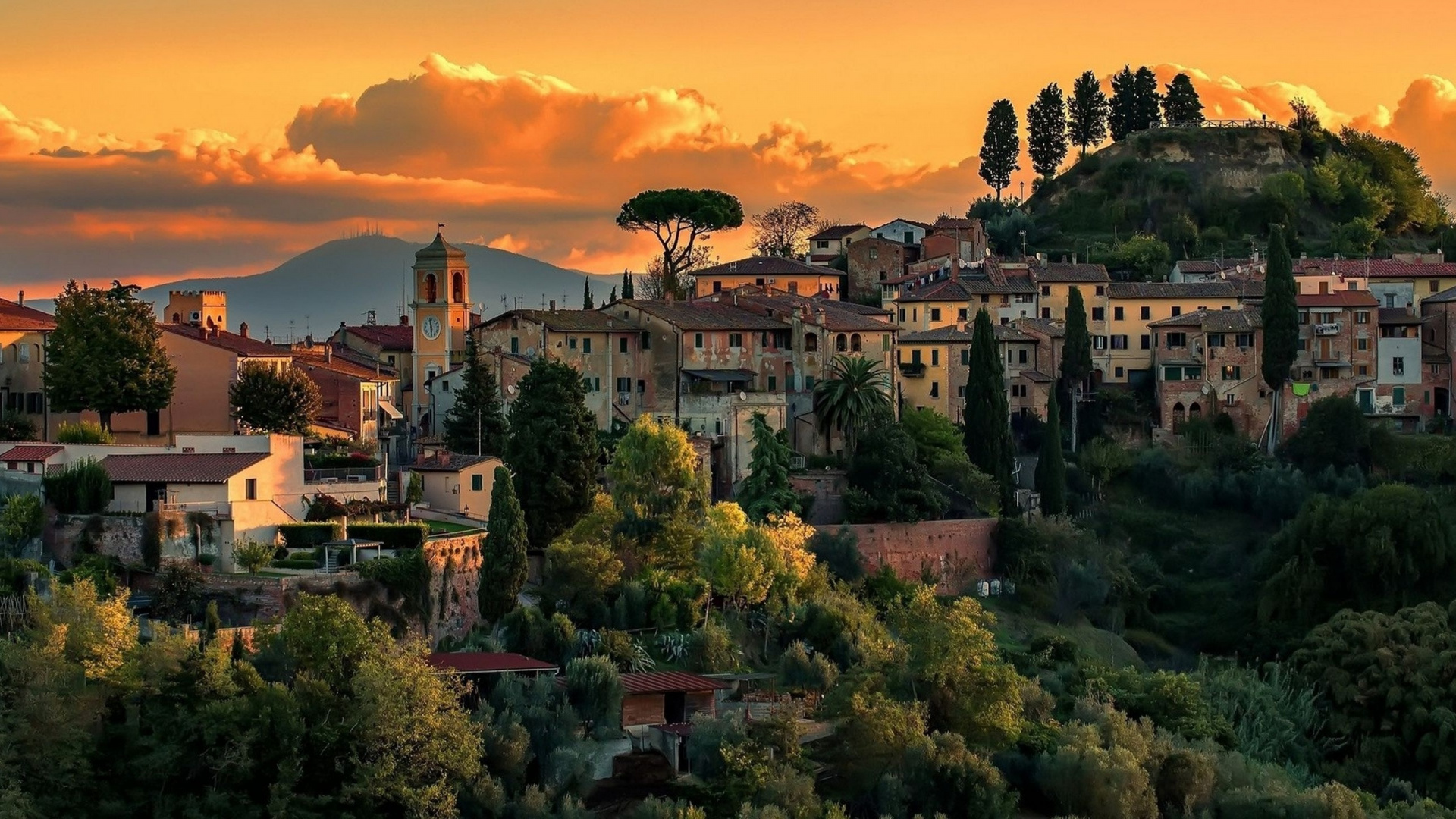 White and Brown Concrete Building Near Green Trees During Sunset. Wallpaper in 1920x1080 Resolution