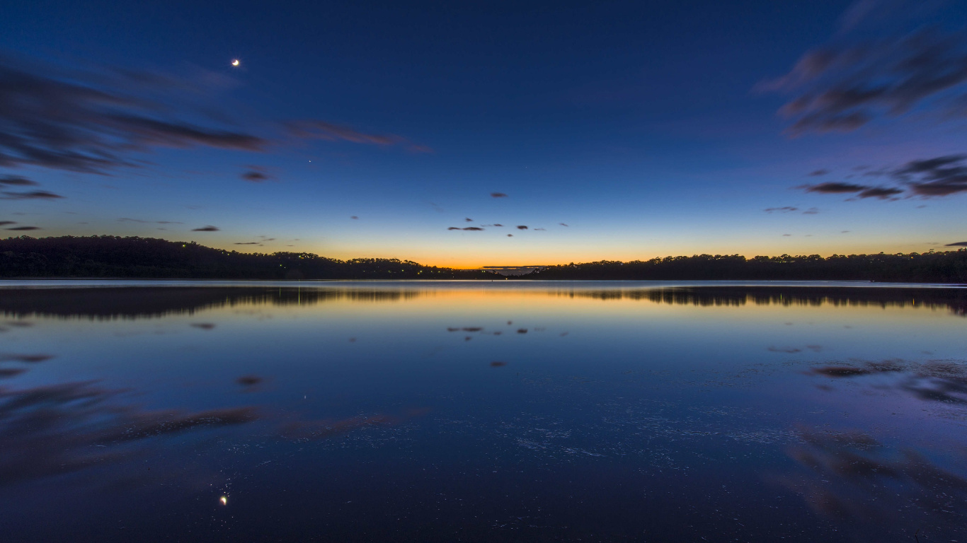 Body of Water Under Blue Sky During Daytime. Wallpaper in 1366x768 Resolution
