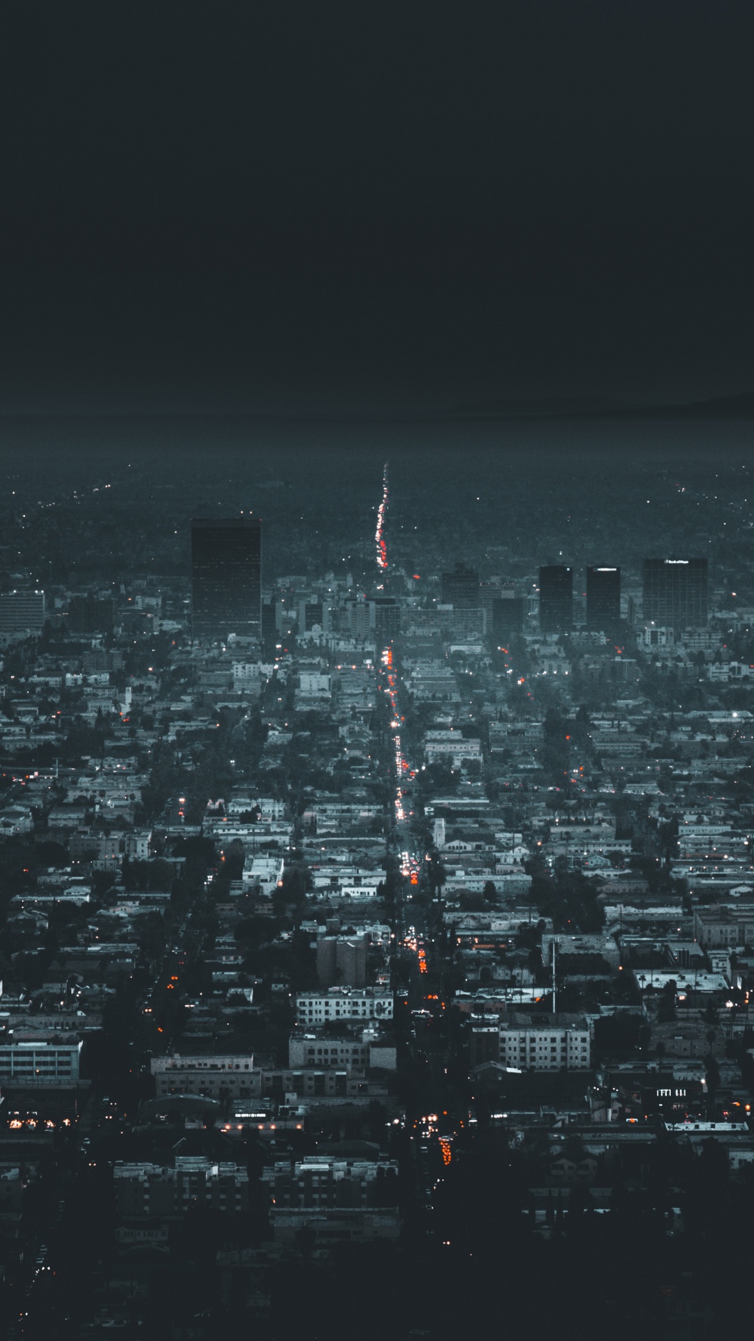 Vue Aérienne Des Bâtiments de la Ville Pendant la Nuit. Wallpaper in 1080x1920 Resolution