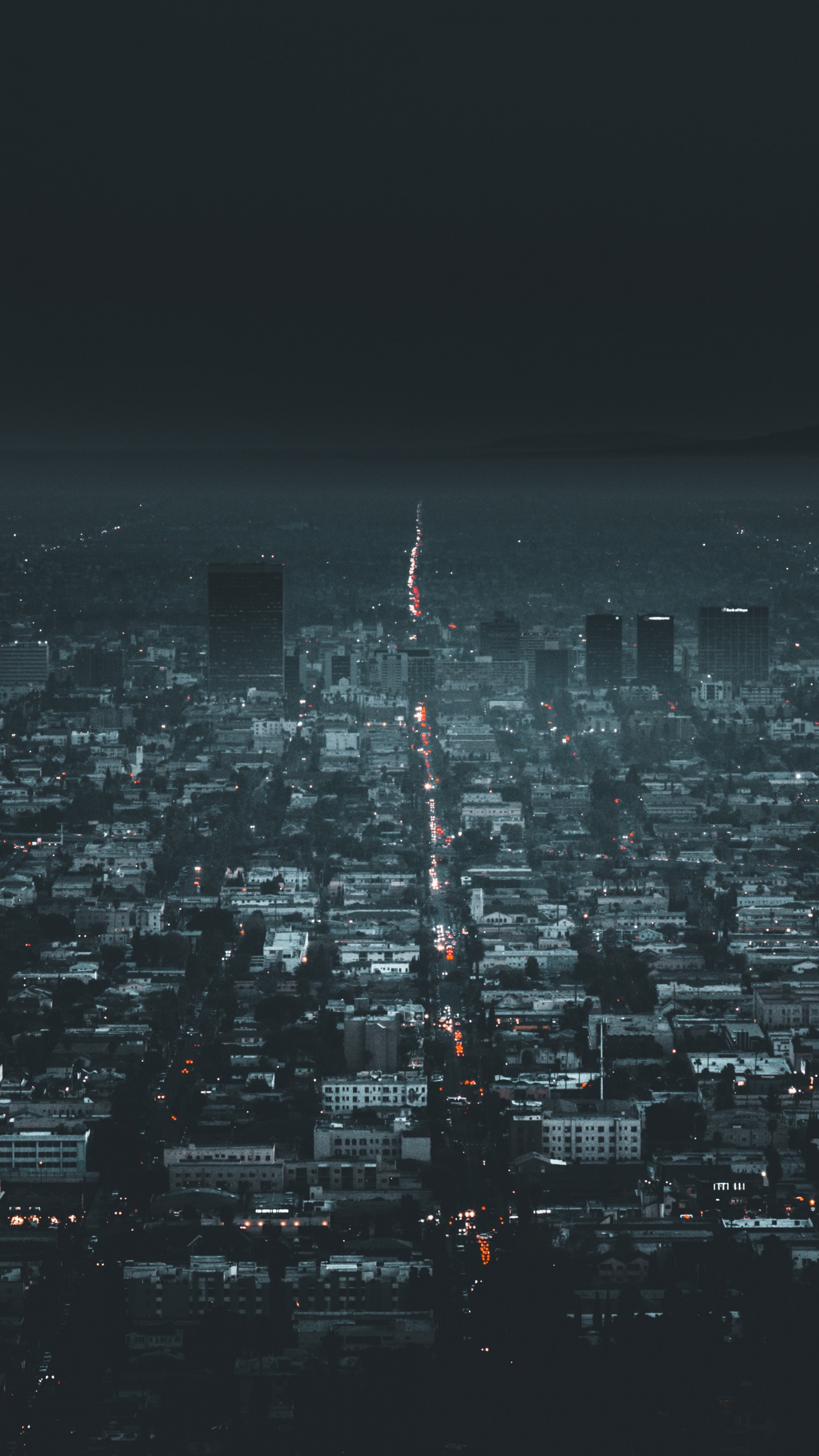 Vue Aérienne Des Bâtiments de la Ville Pendant la Nuit. Wallpaper in 1440x2560 Resolution