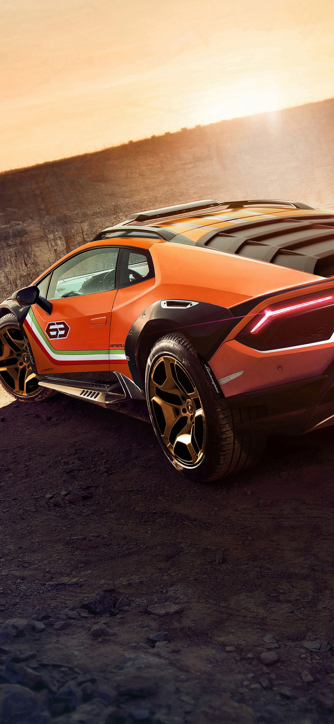 Red and Black Chevrolet Camaro on Brown Sand. Wallpaper in 1125x2436 Resolution