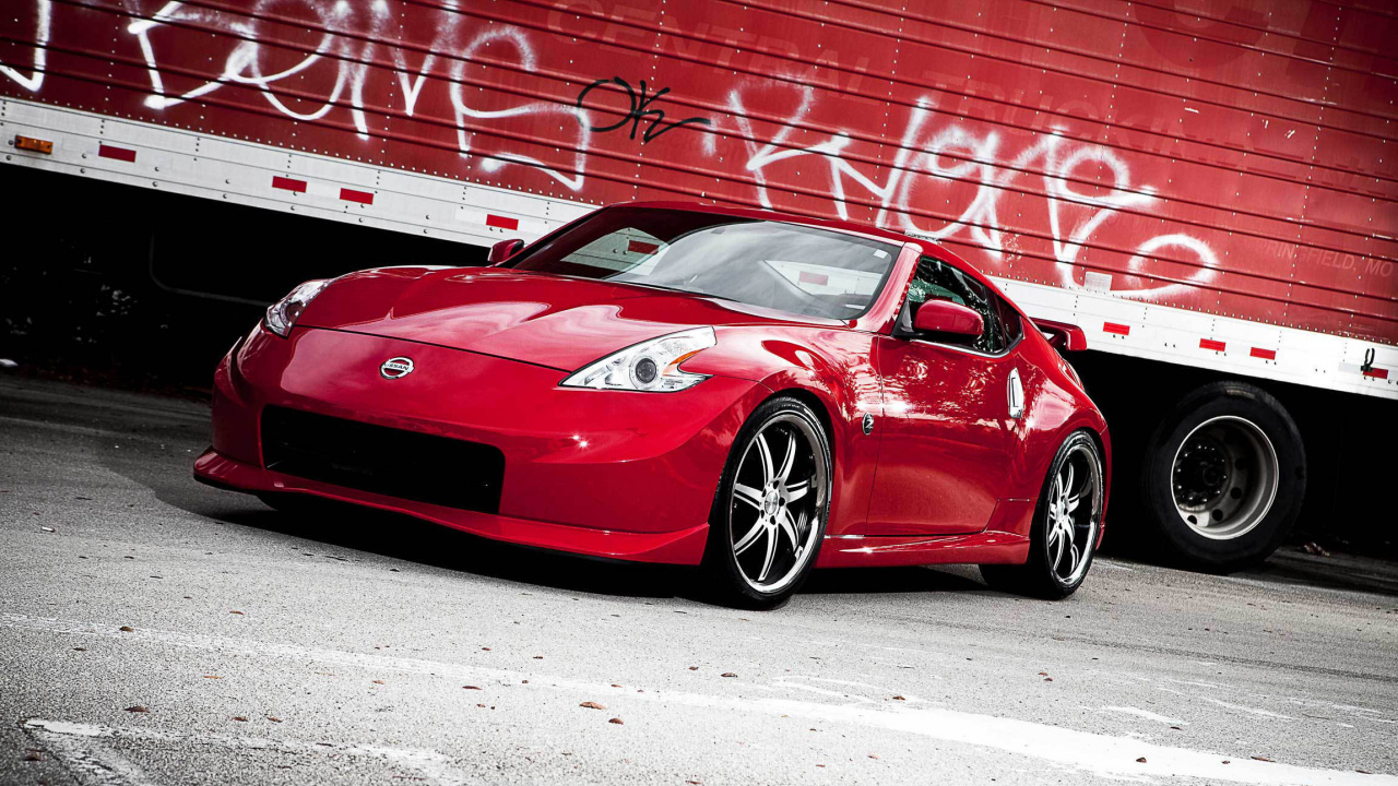 Red Ferrari 458 Italia Parked on Parking Lot During Daytime. Wallpaper in 1280x720 Resolution