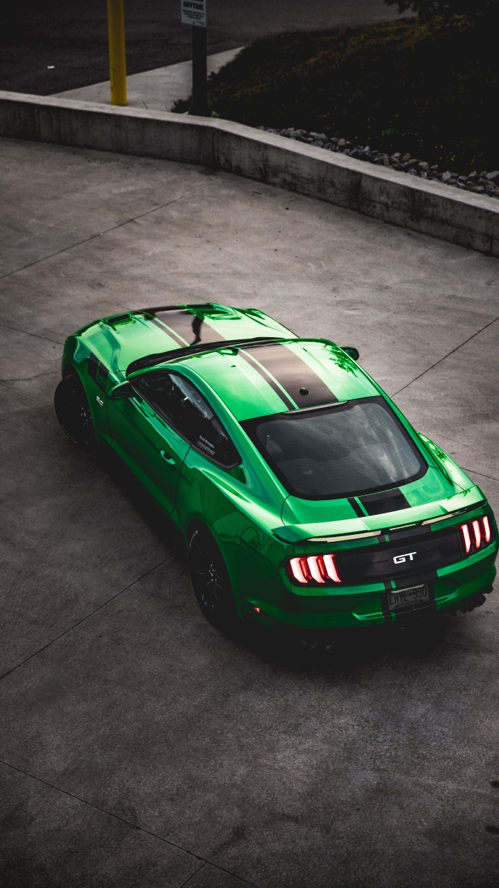 Red and Black Porsche 911 Parked on Gray Pavement. Wallpaper in 720x1280 Resolution