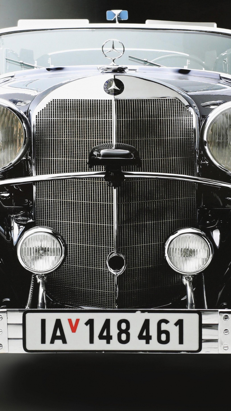 Black and Silver Vintage Car. Wallpaper in 750x1334 Resolution