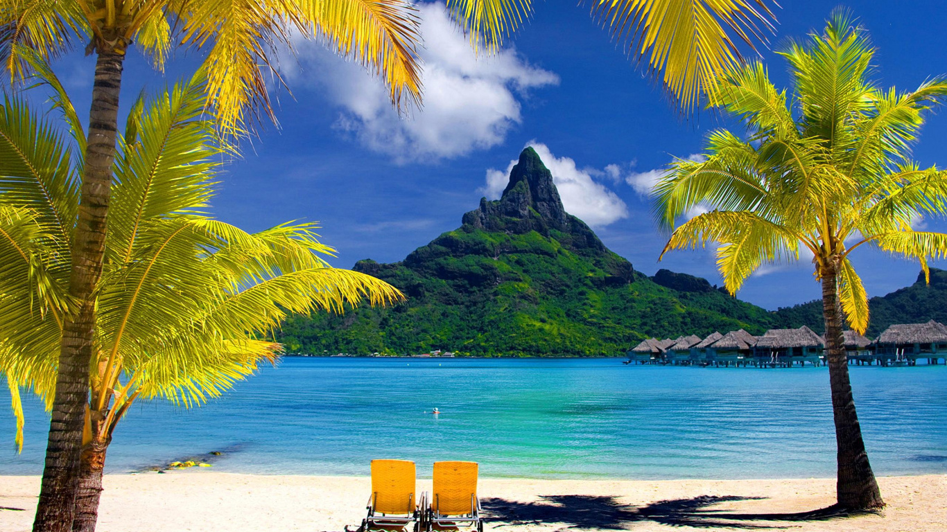 Brown Wooden Bench on White Sand Beach During Daytime. Wallpaper in 1366x768 Resolution