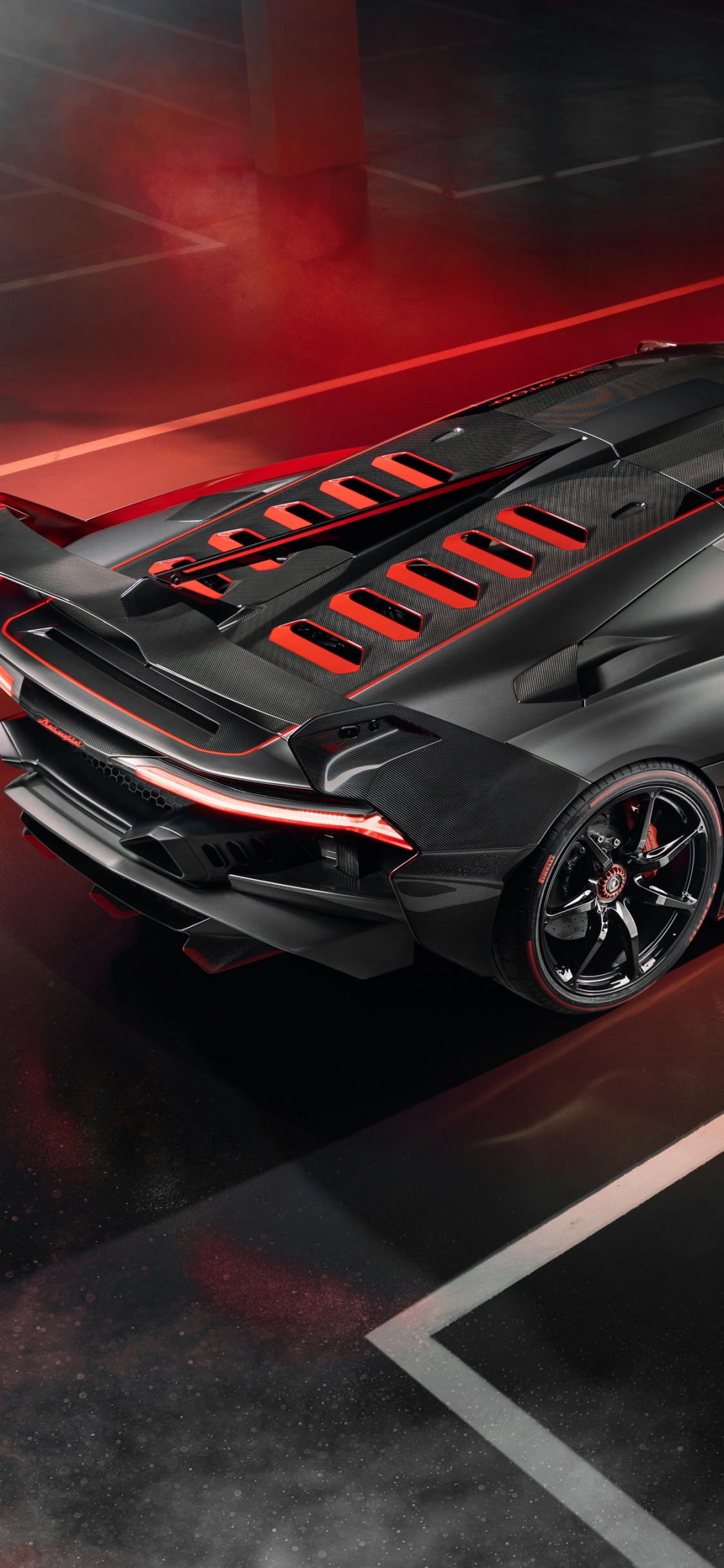 Red and Black Porsche 911. Wallpaper in 1125x2436 Resolution