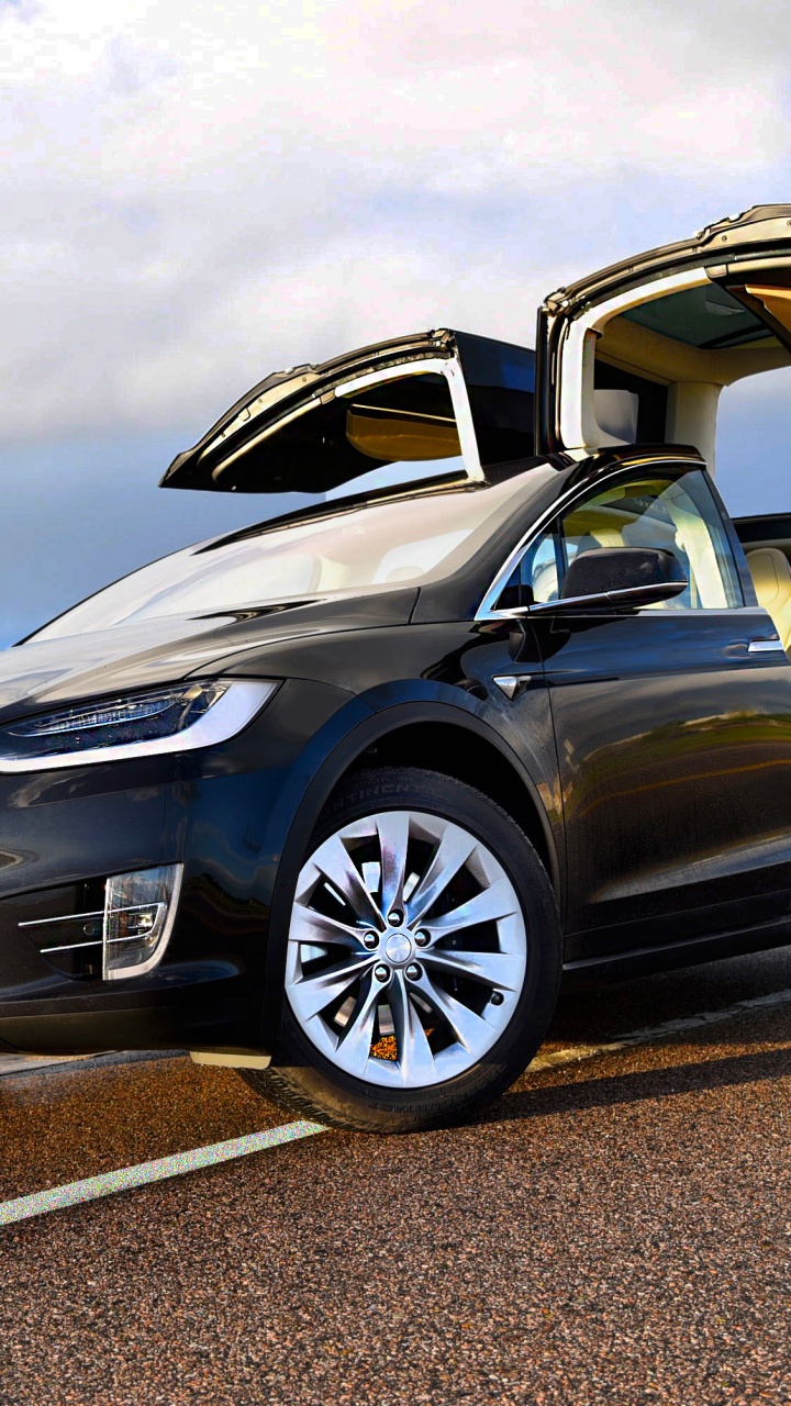 Schwarzer Porsche 911 Tagsüber Unterwegs. Wallpaper in 720x1280 Resolution