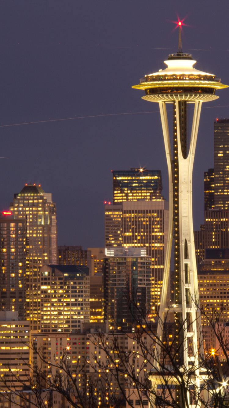 White and Red Tower During Night Time. Wallpaper in 750x1334 Resolution
