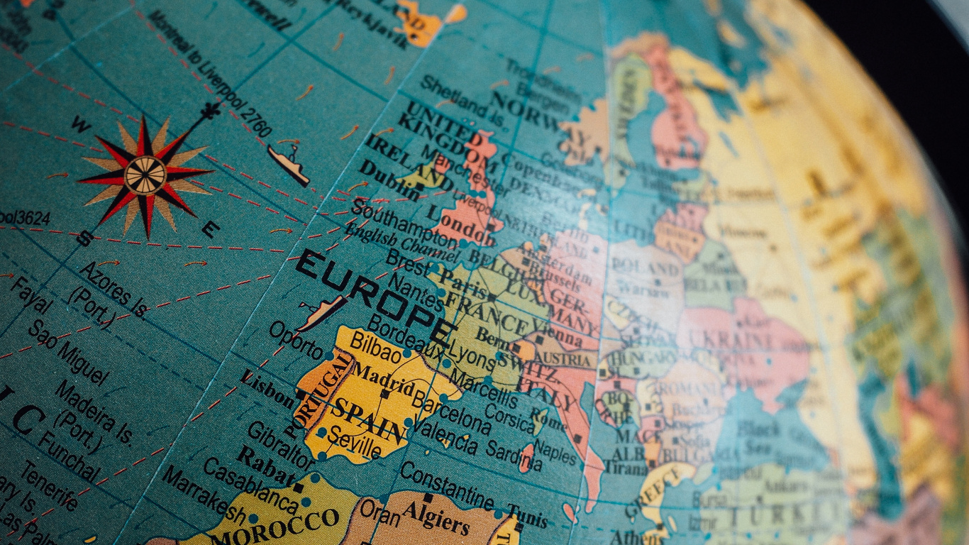 Blue and Brown Desk Globe. Wallpaper in 1366x768 Resolution