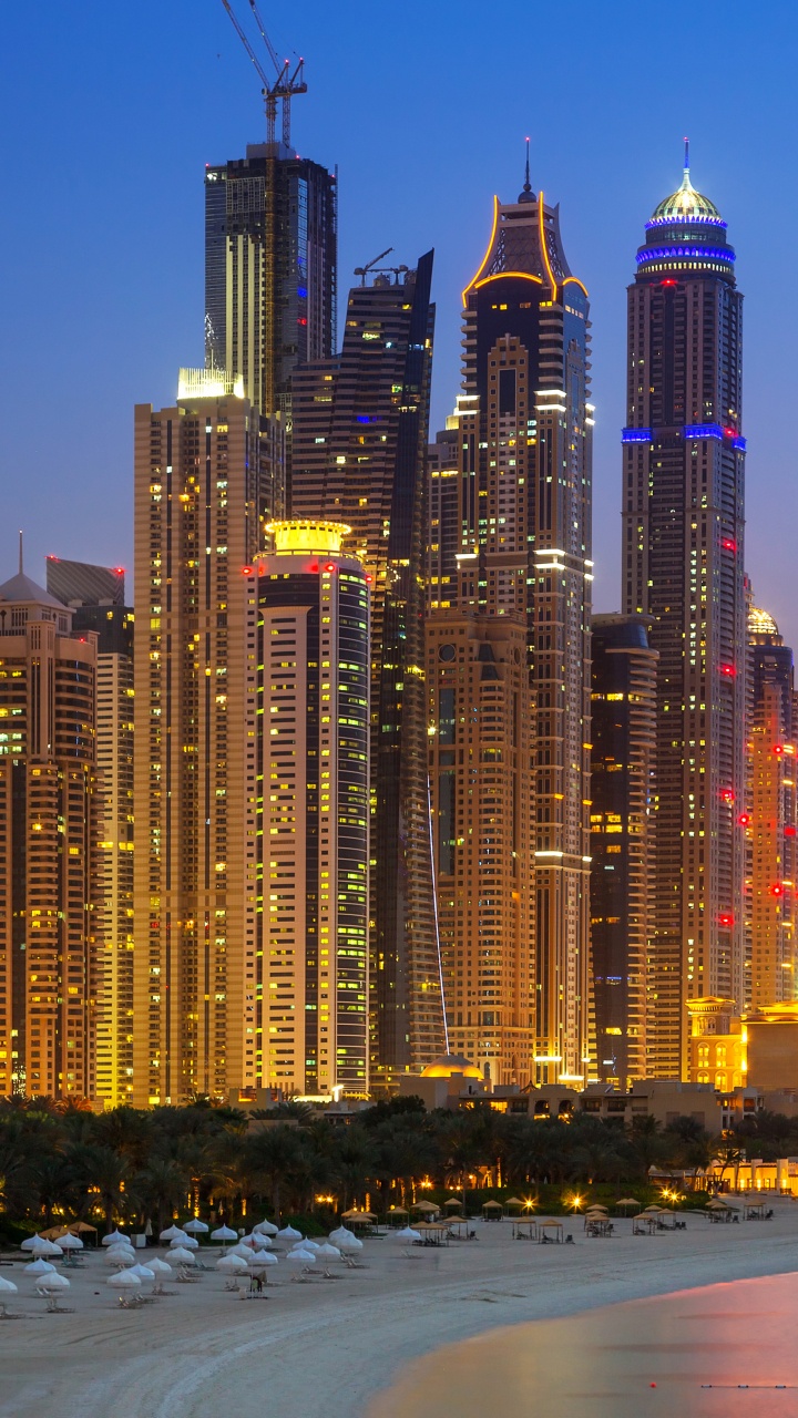 City Skyline During Night Time. Wallpaper in 720x1280 Resolution