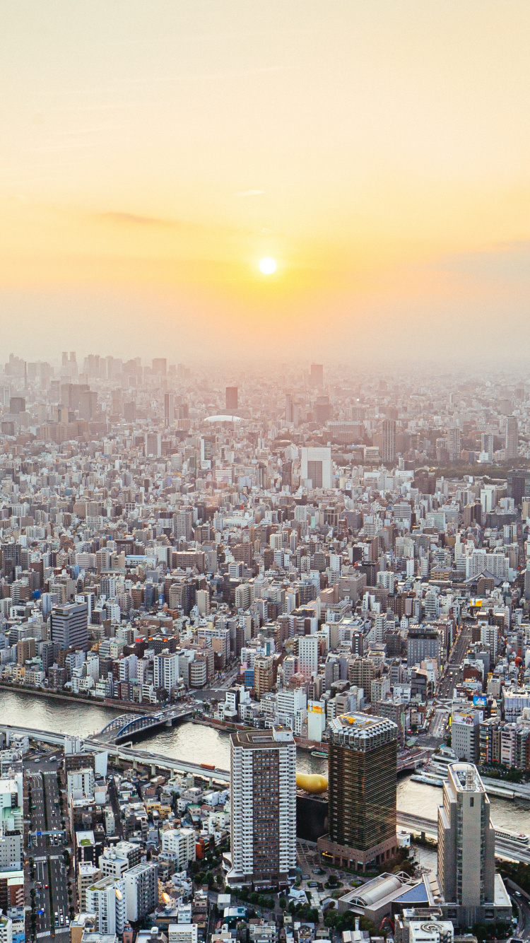 Aerial View of City Buildings During Sunset. Wallpaper in 750x1334 Resolution
