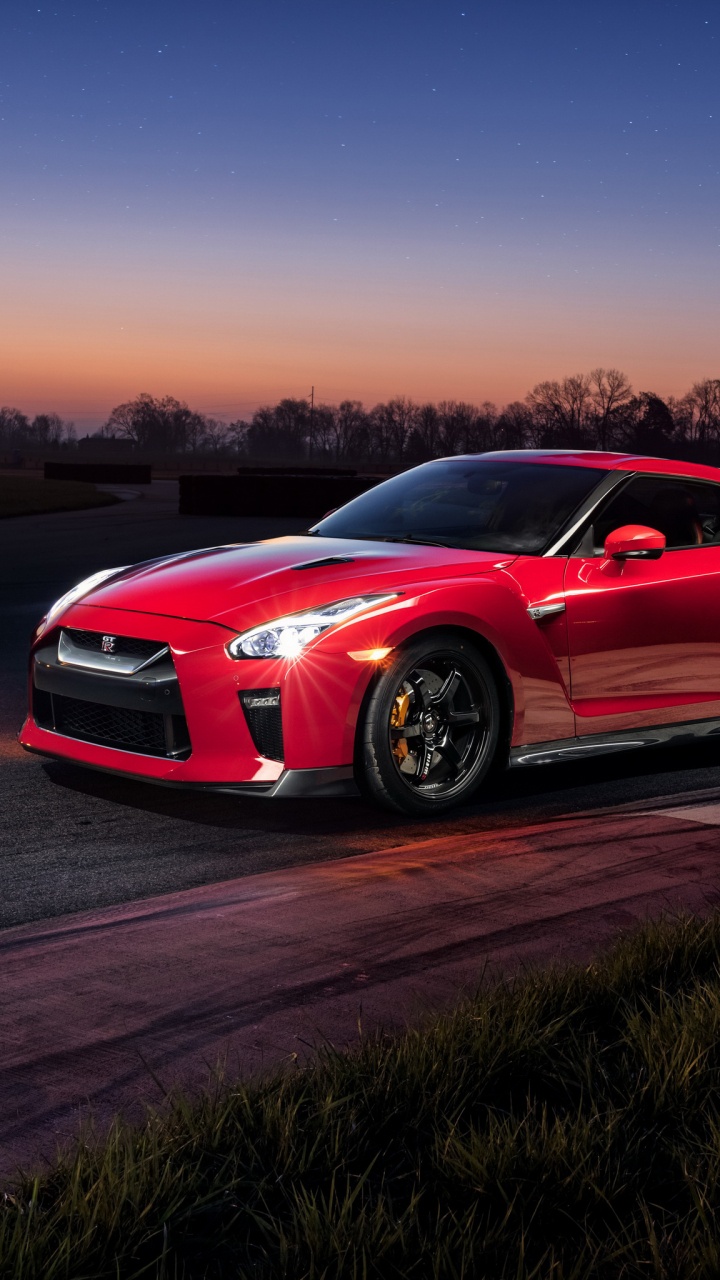 Chevrolet Camaro Rouge Sur Route Pendant la Journée. Wallpaper in 720x1280 Resolution