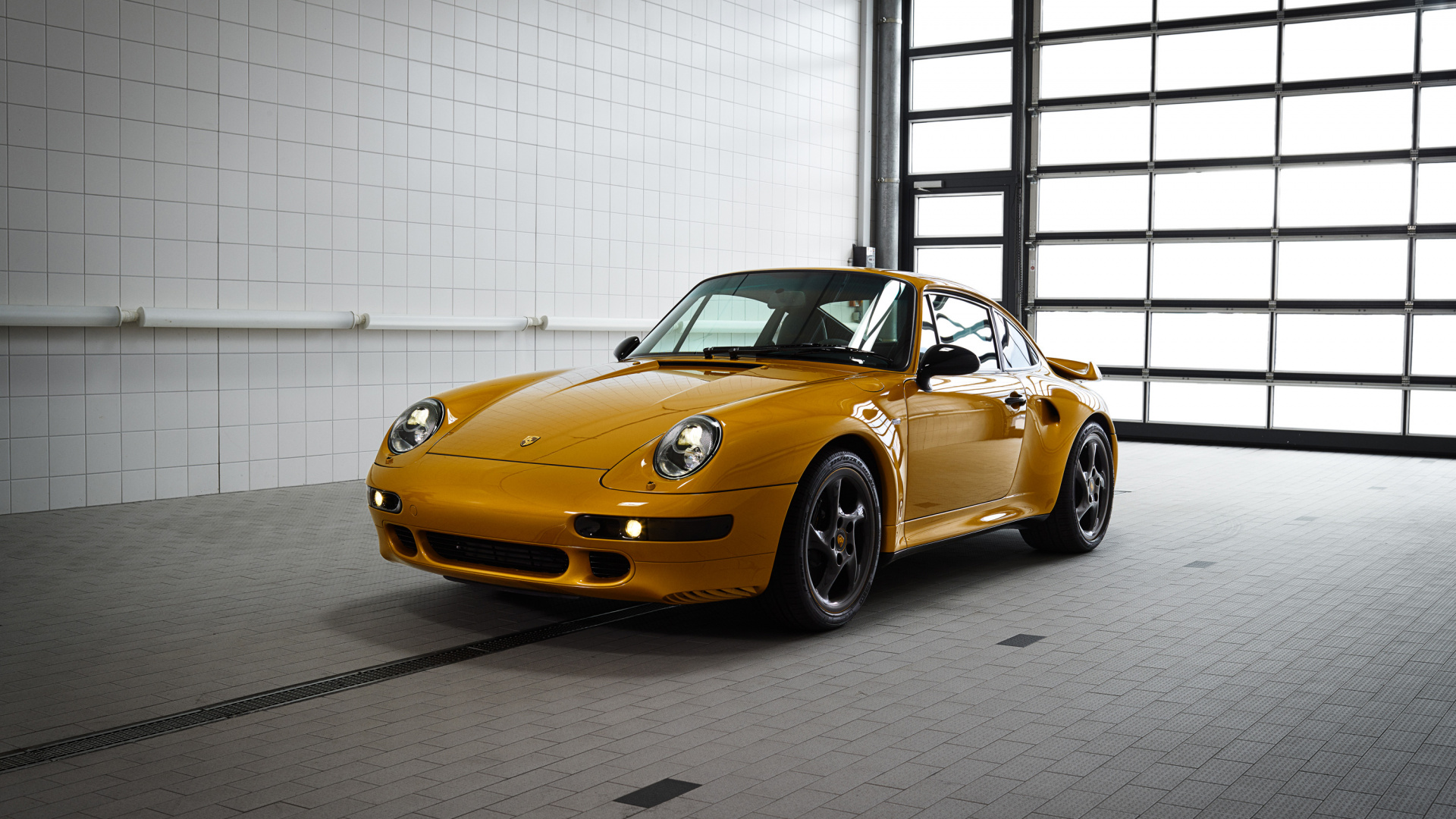 Yellow Porsche 911 Parked in Front of White Wall. Wallpaper in 1920x1080 Resolution