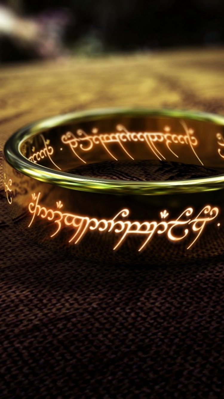 Goldener Und Schwarzer Runder Ring. Wallpaper in 750x1334 Resolution