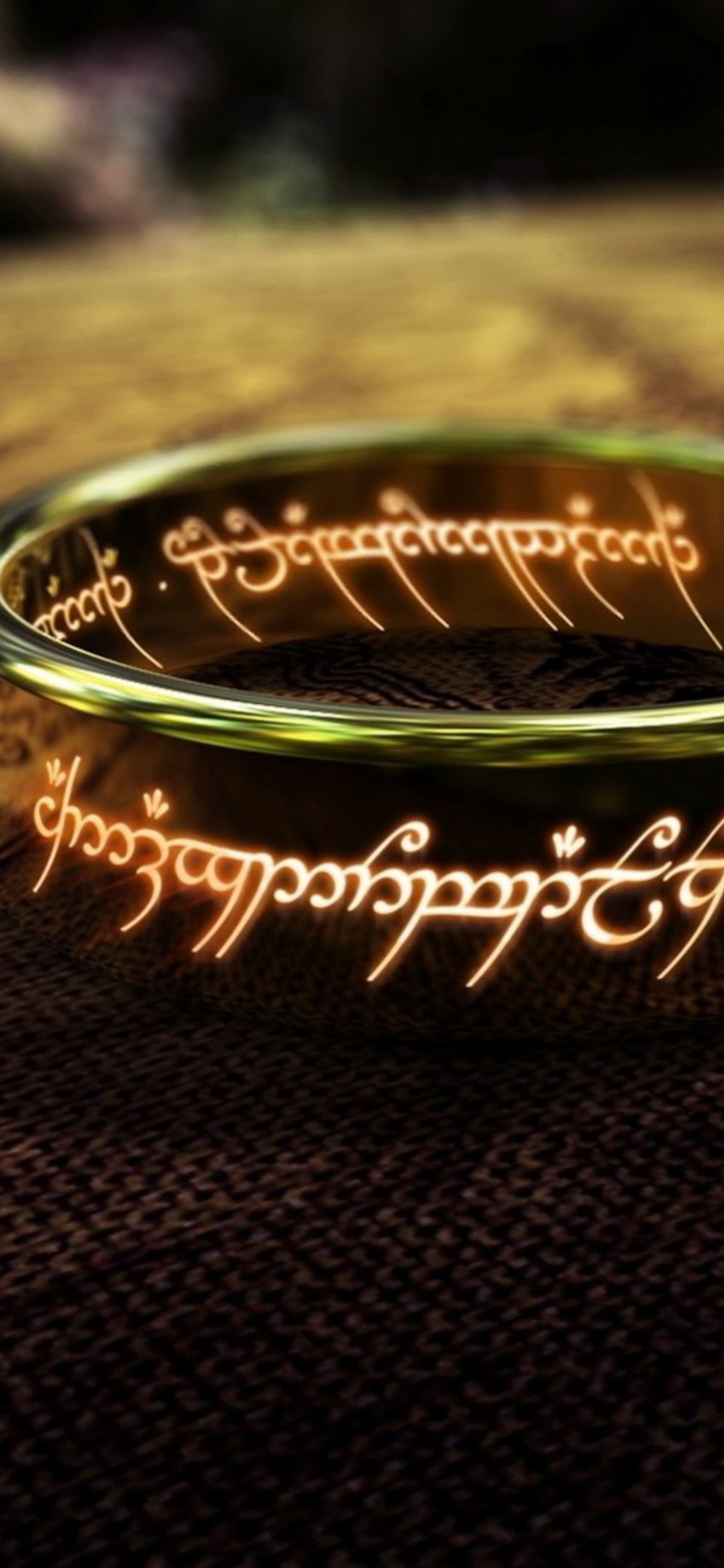 Anillo Redondo de Oro y Negro. Wallpaper in 1125x2436 Resolution