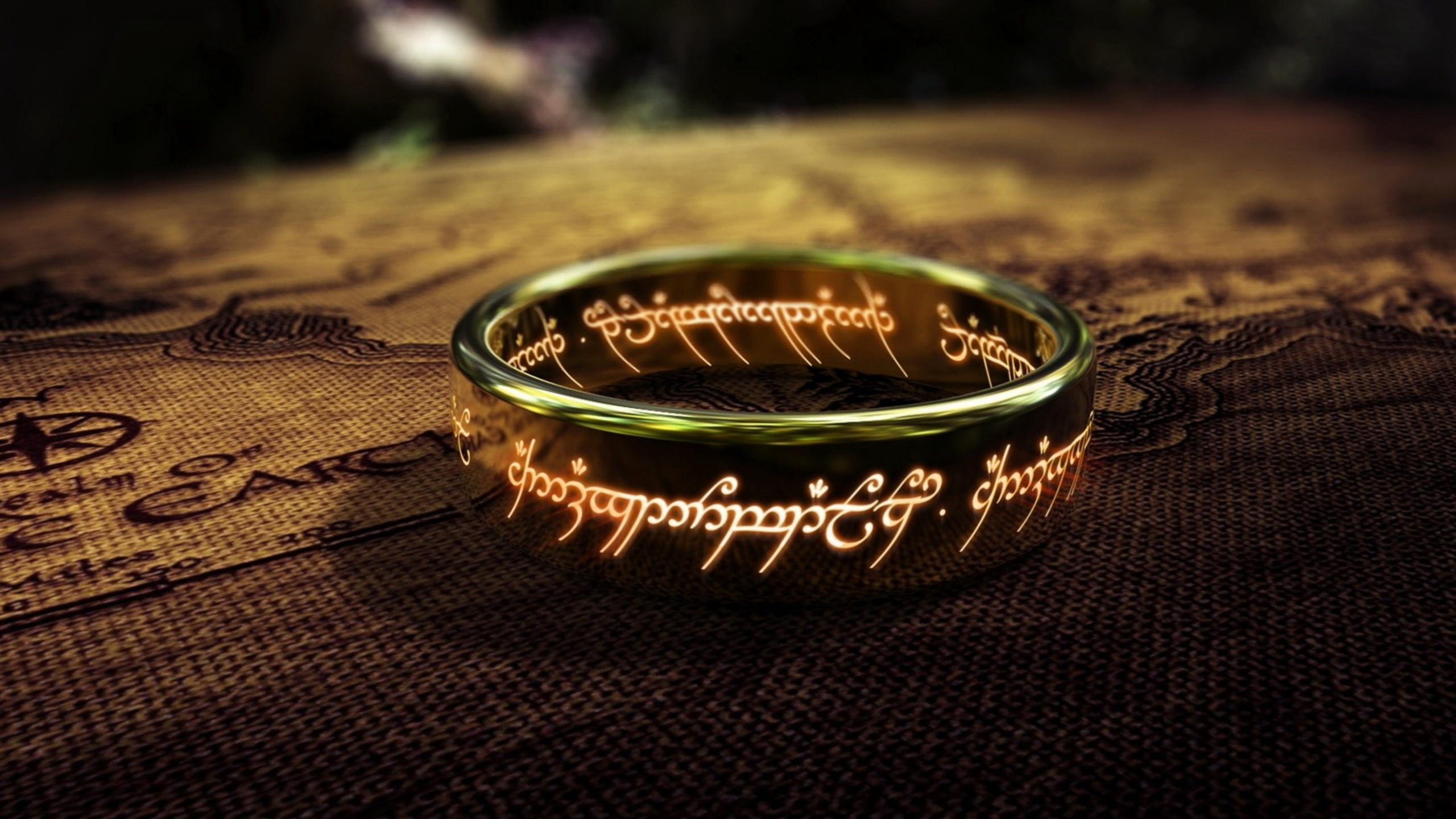 Gold and Black Round Ring. Wallpaper in 2560x1440 Resolution