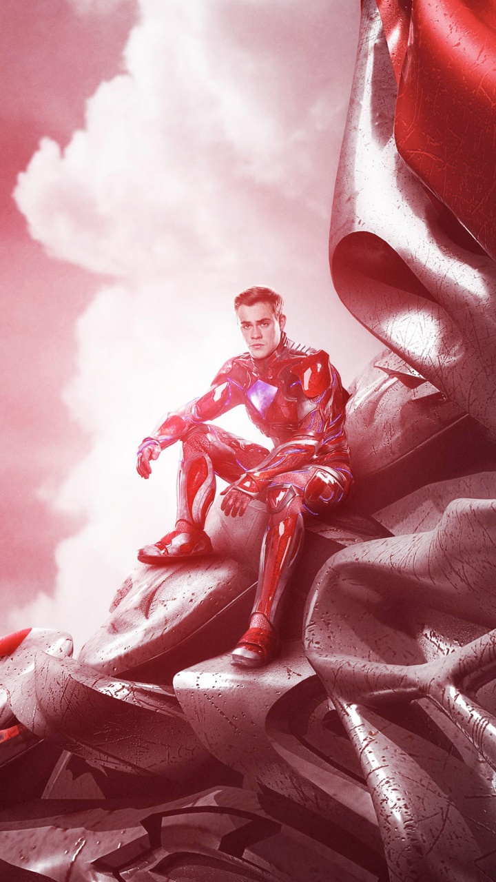 Man in Red Suit Sitting on Rock. Wallpaper in 720x1280 Resolution