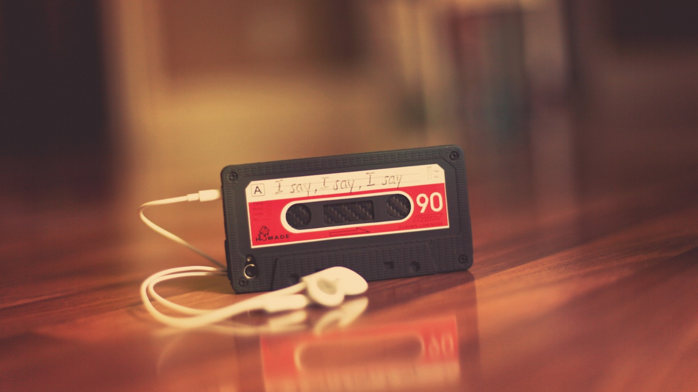 White Earbuds on Brown Wooden Table. Wallpaper in 1366x768 Resolution