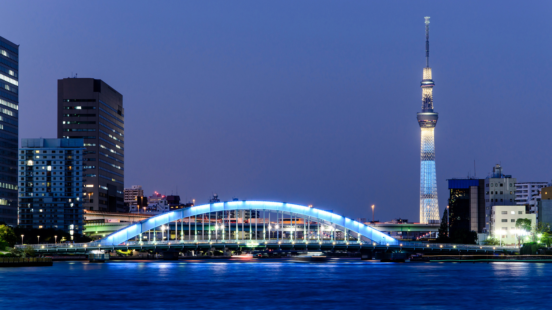 Lighted Bridge Near City Buildings During Night Time. Wallpaper in 1920x1080 Resolution